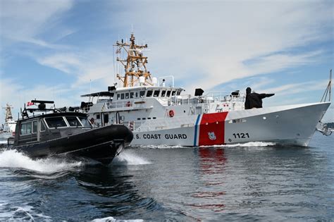 A Coast Guard cutter intercepts a suspect vessel