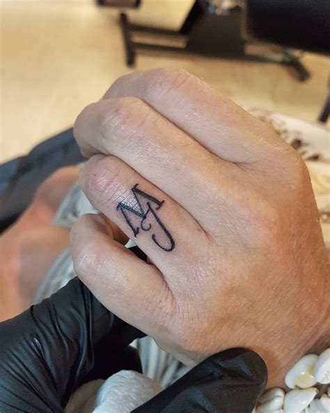 The meaning and significance of initials tattoos