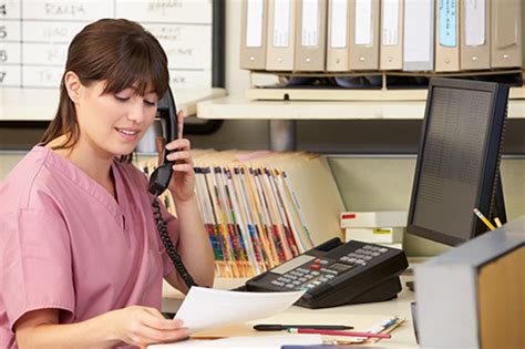 Medical Health Records Technician Communicating with Patient