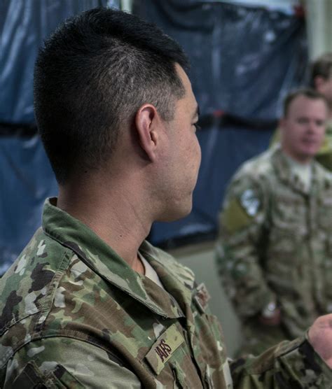 Medical officer examining a patient