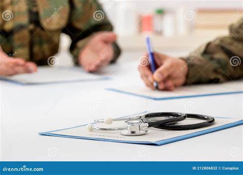 Military Doctor with Patient