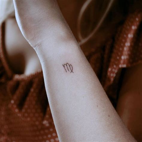 Description of Minimalist Virgo Tattoo