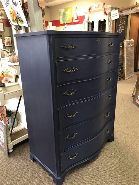 Navy Blue Dresser in a bedroom