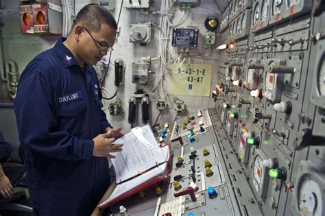 Navy Engineer working on computer systems