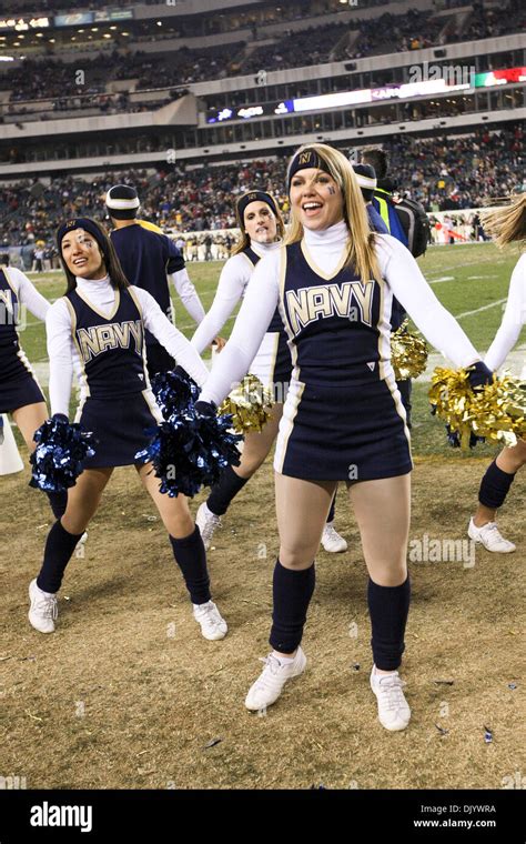 Navy Midshipmen cheerleaders in action