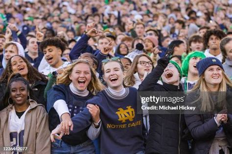 A photo of Navy and Notre Dame fans cheering