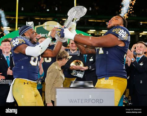 A photo of the trophies awarded to the winner of the Navy-Notre Dame game