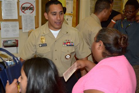 Navy recruiter at a school event