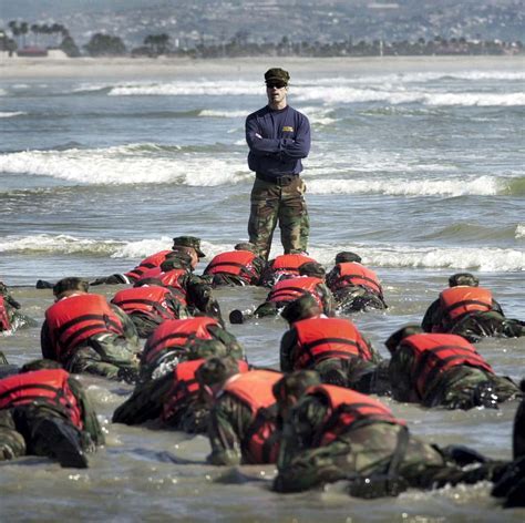 Navy SEALs performing exercises