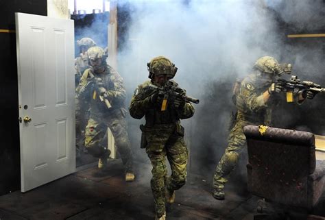 Navy SEALs in close quarters combat