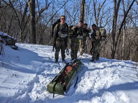 Soldiers participating in a simulated warfare exercise