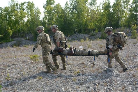 Pararescue recovery specialist in a helicopter