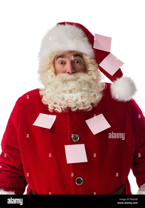 Santa Claus holding a reminder sign