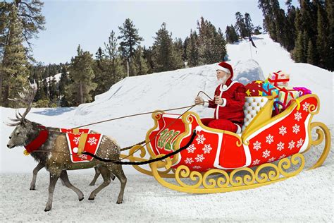 Santa's sleigh ride through a snowy landscape with reindeer