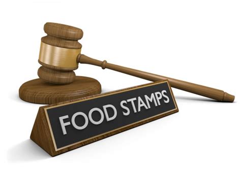 Couple separating with food stamps in the background