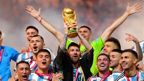 A Soccer Team Lifting a Trophy