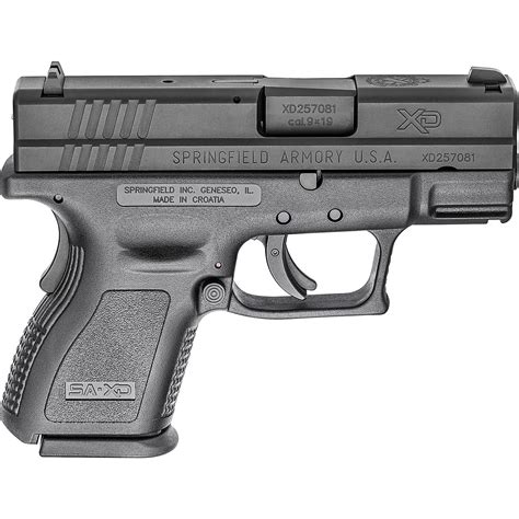 Springfield XDS 9mm pistol with maintenance tools and supplies