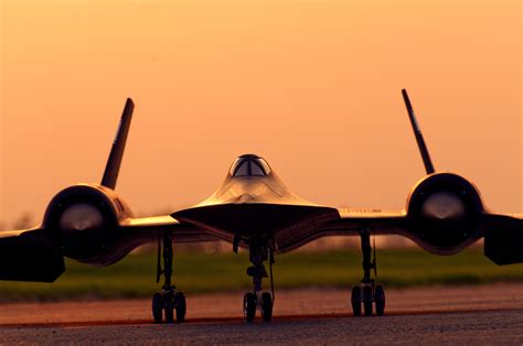 The SR-71's aerodynamic design, featuring its curved wings and fuselage