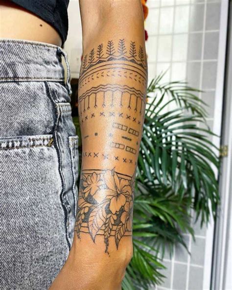 Symbolic Forearm Sleeve Tattoos