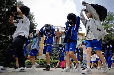 Taiwan Earthquake Drill Participants Evacuating a Building