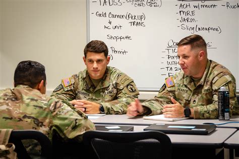 US Army Infantry Officer mentoring soldiers