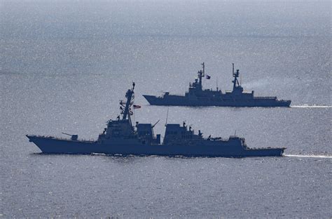 A photo of a U.S. naval vessel conducting a patrol in the South China Sea.