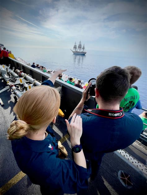 Crew members of the USS George H.W. Bush working on the flight deck