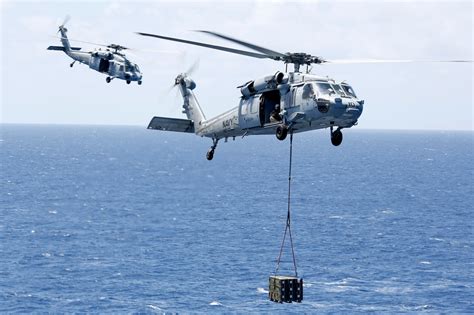 SH-60 Seahawk helicopter taking off from USS Harry S. Truman