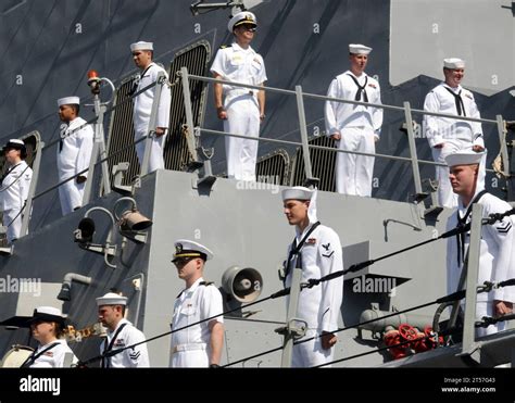 Crew members on board the USS O'Kane