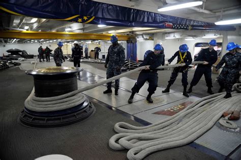 USS Truman Sailors at Work