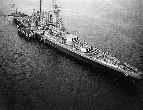 USS Washington BB-56 firing its 14-inch guns