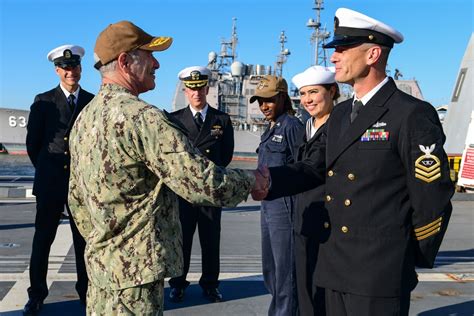 USS Zumwalt's crew, operating the ship's advanced systems