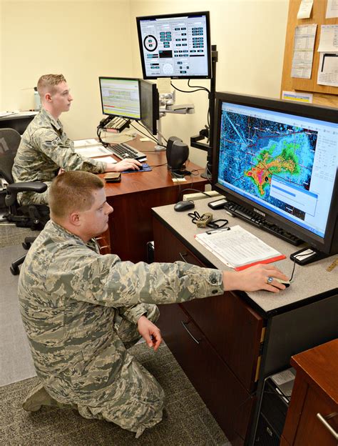 Weather officer analyzing weather data