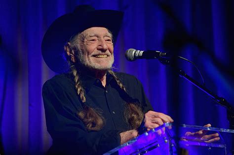 Willie Nelson accepting an award