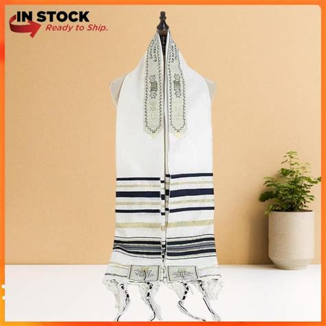 A person wearing a prayer shawl on Yom Kippur