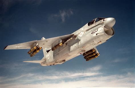 A-7 Corsair in flight, dropping ordnance