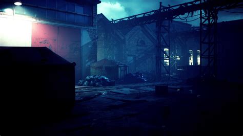 Abandoned factory at night with a haunting atmosphere