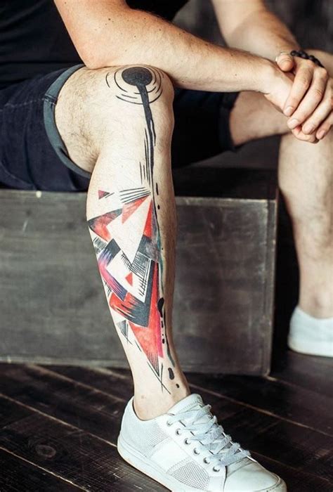 Abstract leg tattoos