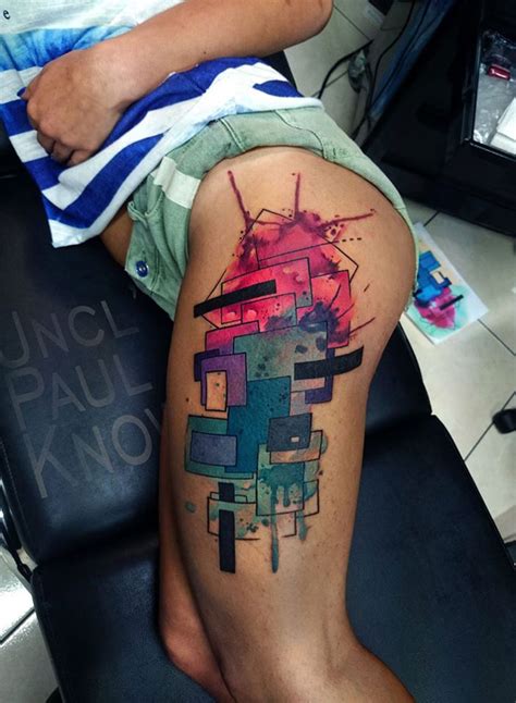 Abstract thigh tattoos