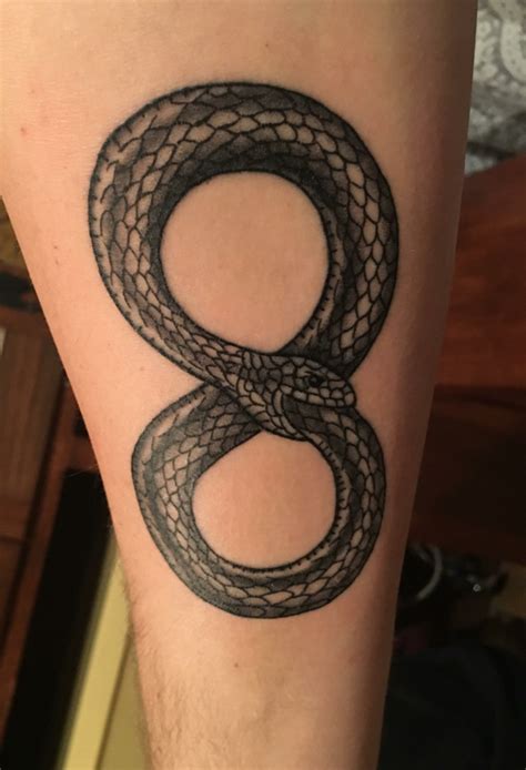 Adam Savage Snake Eating Its Tail Tattoo