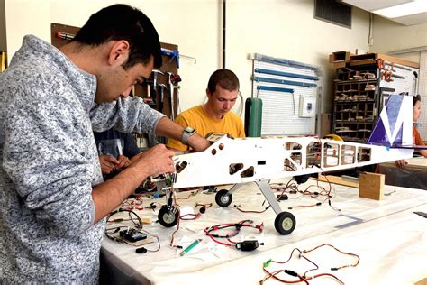 Aerospace engineering students working on a project