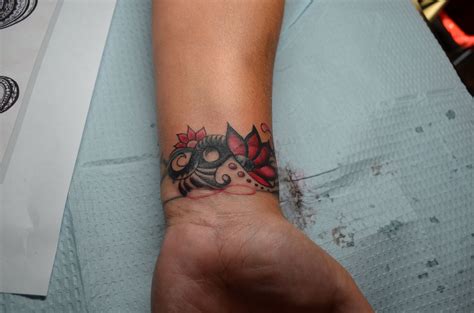 Aftercare and maintenance of wrist tattoo cover ups