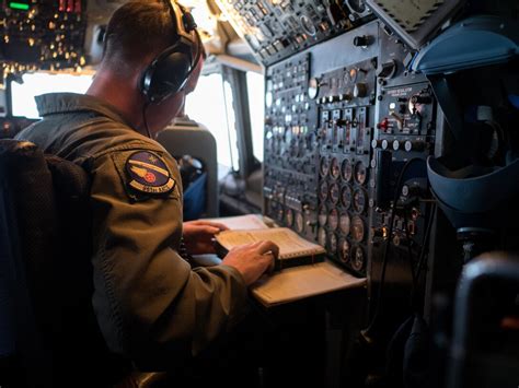 Air Force Flight Engineer in the Cockpit