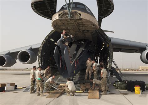 US Air Force C-130 Hercules transporting troops and equipment