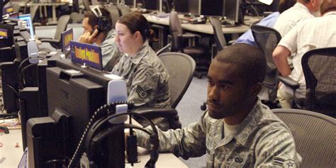 Air Force Signals Intelligence Analysts at work