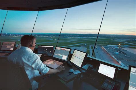 Air traffic controllers in a control tower