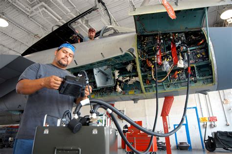 Aircraft mechanic testing aircraft systems