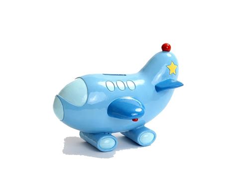 A collection of unique airplane piggy banks