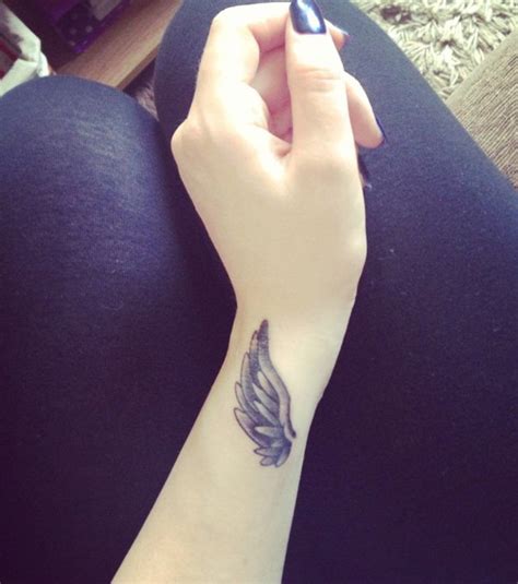 Angle tattoos on the wrist