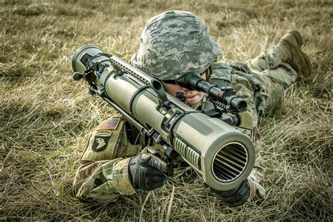 Soldier firing a light anti-tank weapon